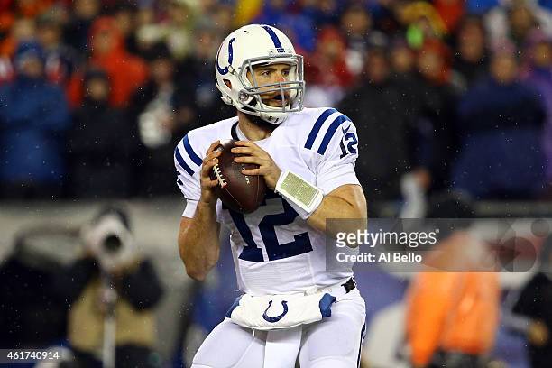 Andrew Luck of the Indianapolis Colts looks to throw a pass during the first quarter against the New England Patriots in the 2015 AFC Championship...