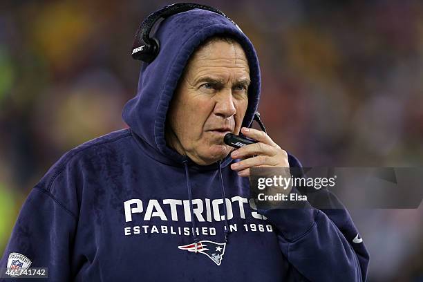 Head coach Bill Belichick of the New England Patriots looks on from the sidleine in the first quarter against the Indianapolis Colts of the 2015 AFC...