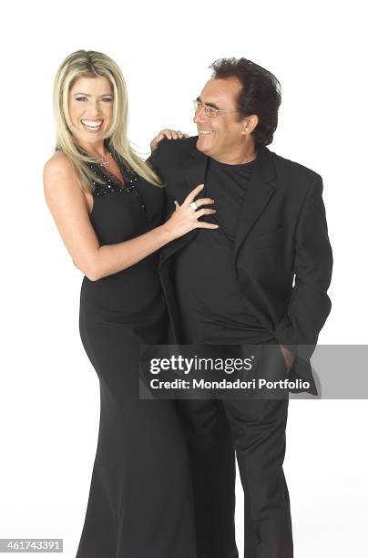 The italian singer Al Bano, born Albano Carrisi, jokes with his partner, the showgirl Loredana Lecciso on February 22, 2002.