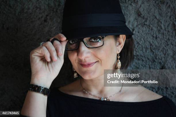 Close up of the italian writer and tv presenter Catena Fiorello, Rosario Fiorello's sister, posing with a hat. Letojanni, 12 marzo 2012