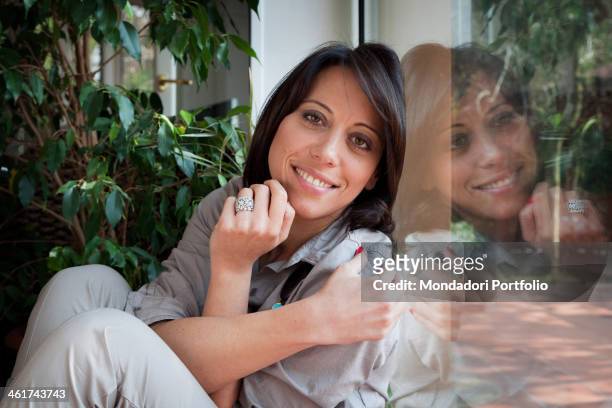 The Italian politician Nunzia De Girolamo smiles in her house in Benevento, wearing the engagement ring, a gift of her boyfriend Franscesco Boccia....