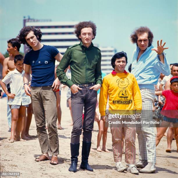 Members of the musical group Equipe 84 at the beach; from the left, Franco Ceccarelli , Maurizio Vandelli , Alfio Cantarella and Victor Sogliani ....