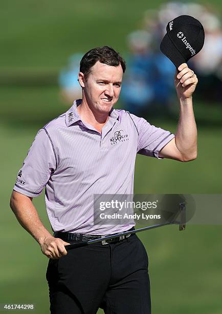 Jimmy Walker celebrates on the 18th green after winning the final round of the Sony Open In Hawaii at Waialae Country Club on January 18, 2015 in...