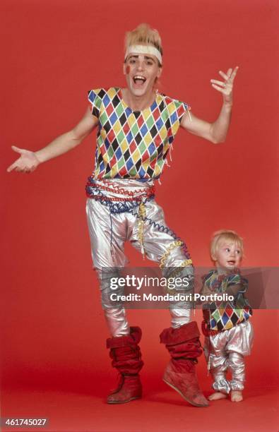 Italian singer-songwriter Alberto Camerini posing wearing a Harlequin costume. 1982