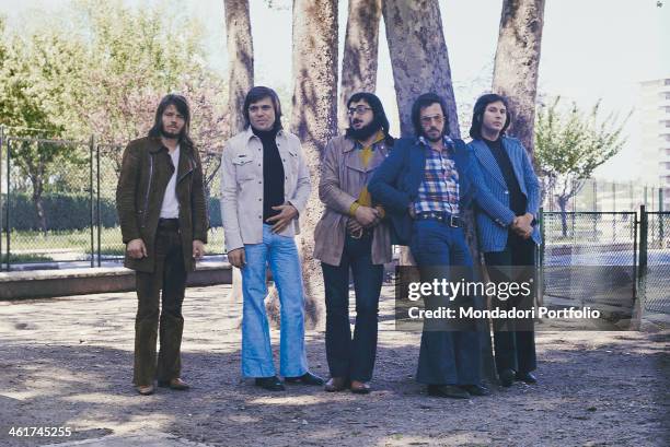 Italian band Nomadi posing near some trees. The band is composed by Italian singer Augusto Daolio, Italian keyboard player Beppe Carletti , Italian...