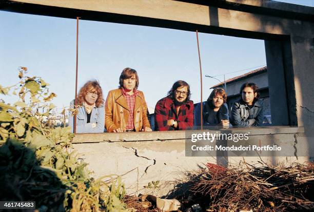 Italian band Nomadi posing leaned against a parapet. The band is composed by Italian singer Augusto Daolio, Italian keyboard player Beppe Carletti ,...