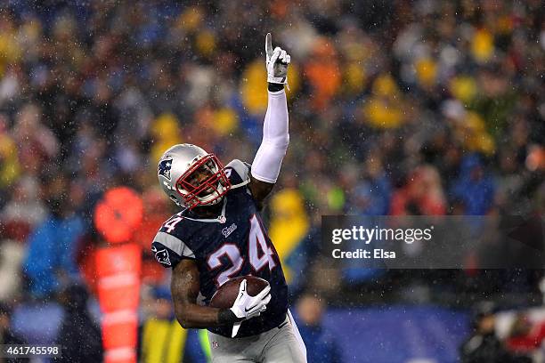 Darrelle Revis of the New England Patriots celebrates after an interception in the third quarter against the Indianapolis Colts of the 2015 AFC...