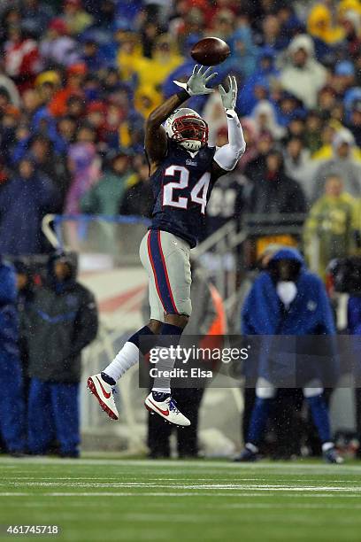 Darrelle Revis of the New England Patriots intercepts a pass by Andrew Luck of the Indianapolis Colts in the third quarter of the 2015 AFC...