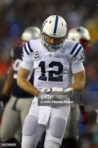 Andrew Luck of the Indianapolis Colts reacts in the fourth quarter against the New England Patriots in the 2015 AFC Championship Game at Gillette...