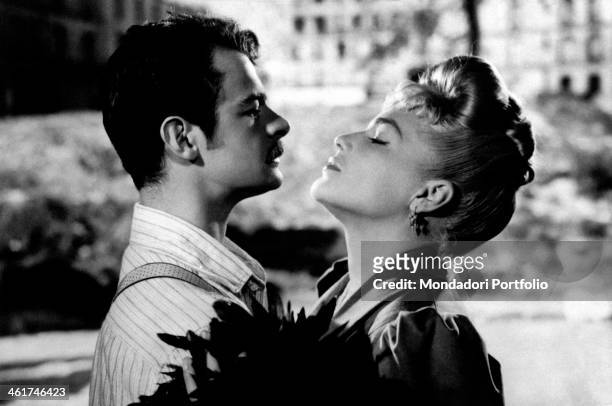 French actors Serge Reggiani and Simone Signoret in a scene from 'Casque d'or' , a tragic romance directed by Jacques Becker for Speva and Paris...