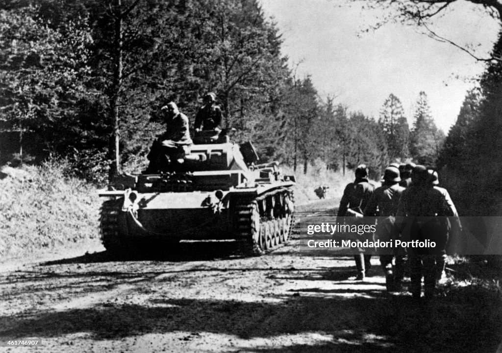 A tank going in the Ardennes Forest 