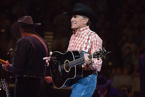 Musician/vocalist George Strait performs in concert during 'George Strait: The Cowboy Rides Away Tour' at the Frank Erwin Center on January 10, 2014...