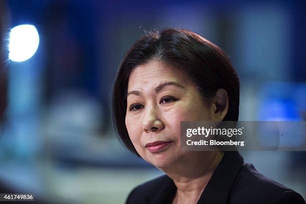 Teresita Sy-Coson, vice chairperson of SM Investments Corp., listens during a Bloomberg Television interview at the Hong Kong Asian Financial Forum...