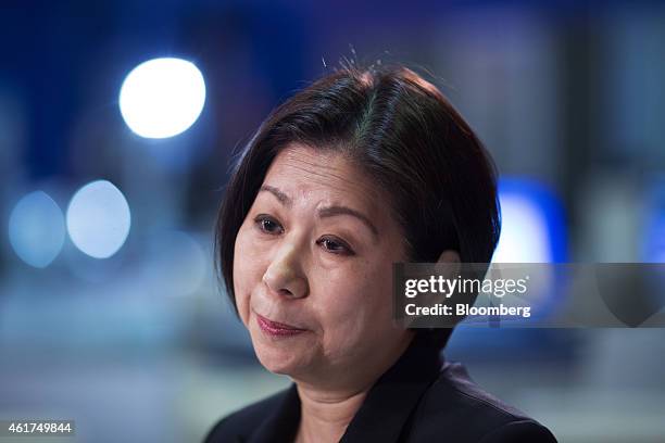 Teresita Sy-Coson, vice chairperson of SM Investments Corp., listens during a Bloomberg Television interview at the Hong Kong Asian Financial Forum...