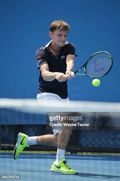 David Goffin of Belgium plays a backhand in his first round match against Michael Russell of the United States during day one of the 2015 Australian...