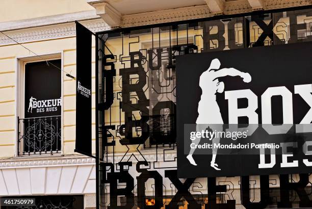 The sign of Boxeur Des Rues clothes shop in via Torino. Milan, Italy. 2013