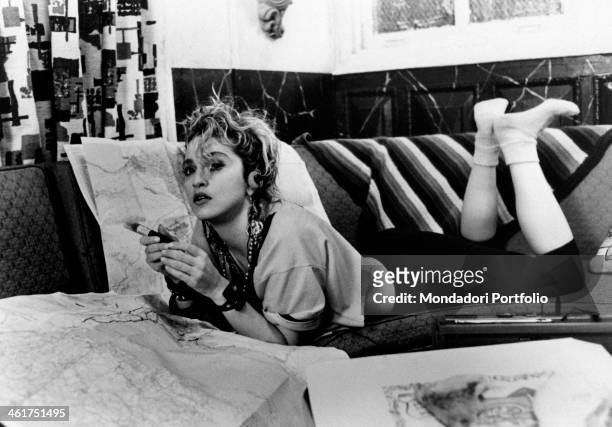 American singer-songwriter and actress Madonna lying on a sofa in the film Desperately Seeking Susan. New York, 1985