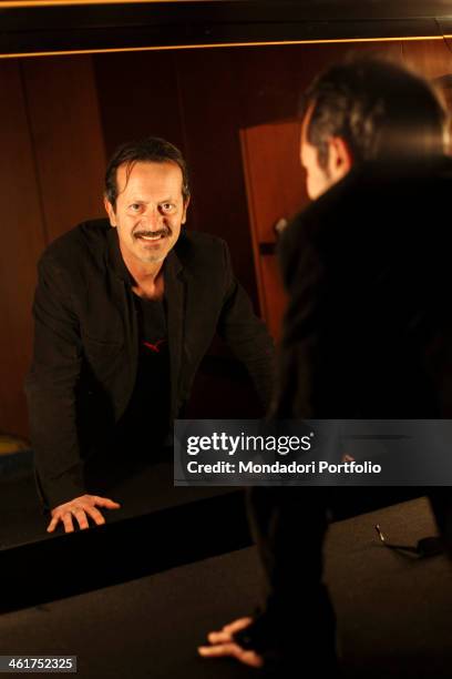 The actor, director and musician Rocco Papaleo during a photo shooting at the Arcimboldi Theatre for the music show Una piccola impresa meridionale....