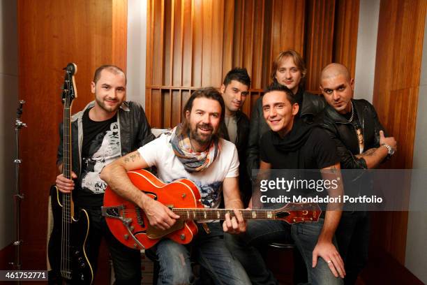 Modà and Jarabe de Palo during a photo shooting at the RTL 102.5 recording studios for the making of the video of the song Come un pittore. Cologno...