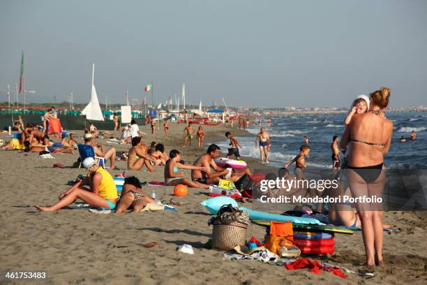 People at the beach in Forte dei Marmi during a photo shooting. Forte dei Marmi, Italy. 15th July 2009