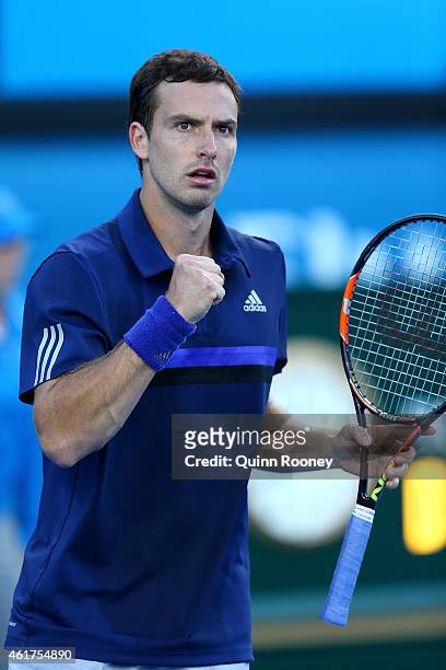 Ernests Gulbis of Latvia celebrates a point in his first round match against Thanasi Kokkinakis of Australia during day one of the 2015 Australian...
