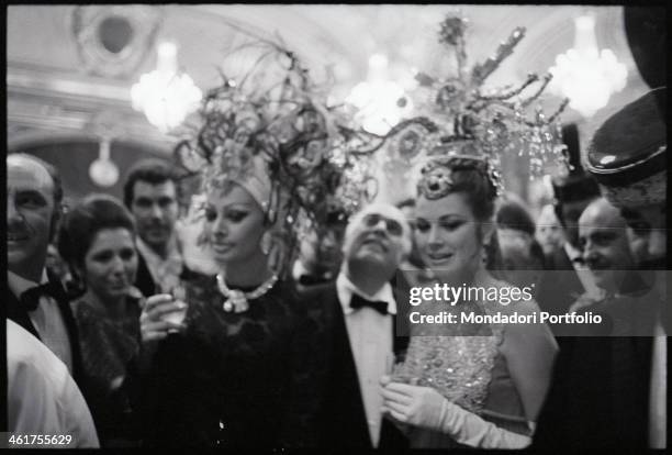 Italian actress Sophia Loren and Princess of Monaco and American actress Grace Kelly attending the social event held by the Société des Bains de Mer...