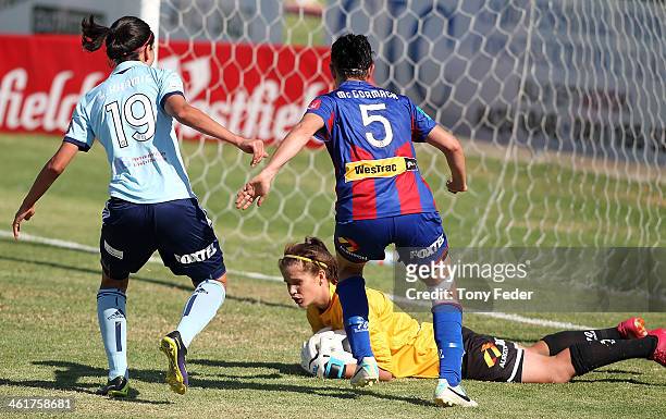 Goalkeeper Eliza Campbell of the Jets dives on the ball during the round eight W-League match between the Newcastle Jets and Sydney FC at Wanderers...