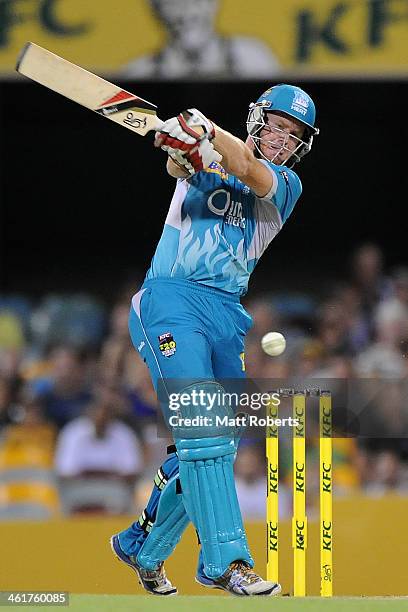 Chris Sabburg of the Heat bats during the Big Bash League match between Brisbane Heat and the Melbourne Stars at The Gabba on January 11, 2014 in...