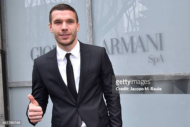 Lukas Podolski is seen leaving the the Emporio Armani Show as a part of Milan Menswear Fashion Week Fall Winter 2015/2016 on January 19, 2015 in...