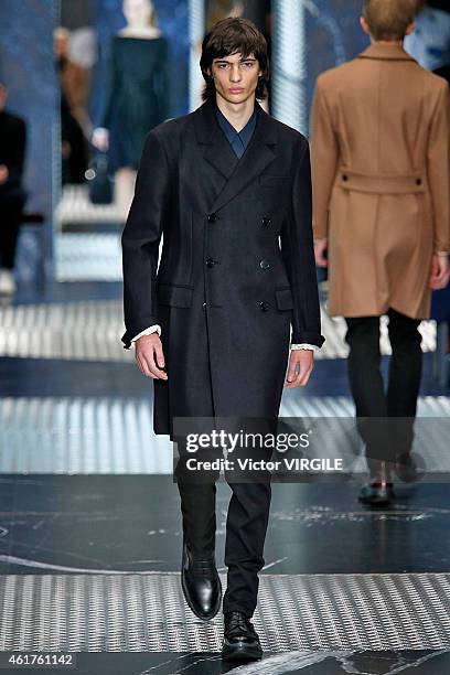 Model walks the runway at the Prada Autumn Winter 2015 fashion show during Milan Menswear Fashion Week on January 18, 2015 in Milan, Italy.