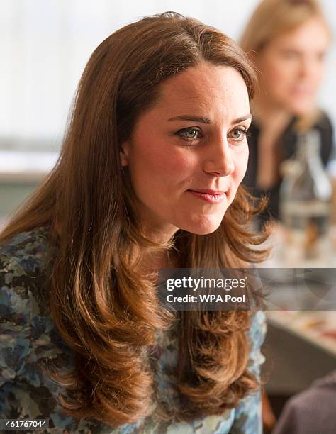 Catherine, Duchess of Cambridge attends a coffee morning at Family Friends in Kensington on January 19, 2015 in London, England. Family Friends is a...