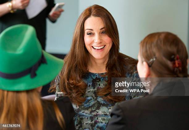 Catherine, Duchess of Cambridge attends a coffee morning at Family Friends in Kensington on January 19, 2015 in London, England. Family Friends is a...