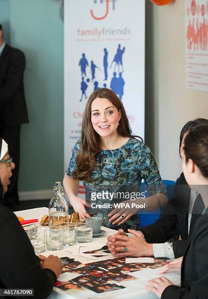 Catherine, Duchess of Cambridge attends a coffee morning at Family Friends in Kensington on January 19, 2015 in London, England. Family Friends is a...