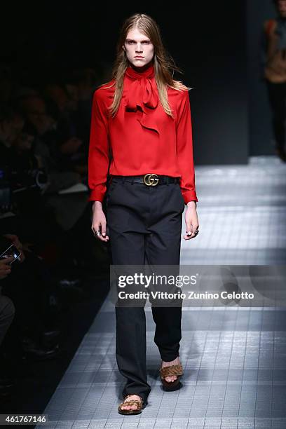 Model walks the runway during the Gucci Show as part of Milan Menswear Fashion Week Fall Winter 2015/2016 on January 19, 2015 in Milan, Italy.