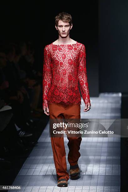 A model walks the runway during the Gucci Show as part of Milan Menswear Fashion Week Fall Winter 2015/2016 on January 19, 2015 in Milan, Italy.