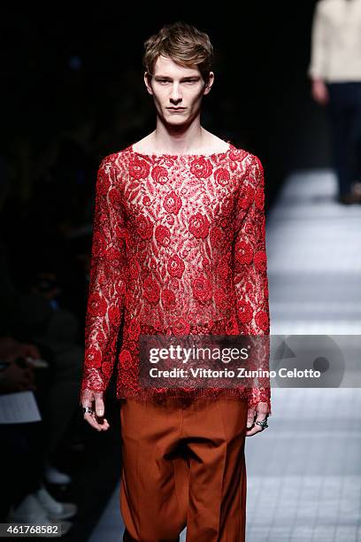 A model walks the runway during the Gucci Show as part of Milan Menswear Fashion Week Fall Winter 2015/2016 on January 19, 2015 in Milan, Italy.