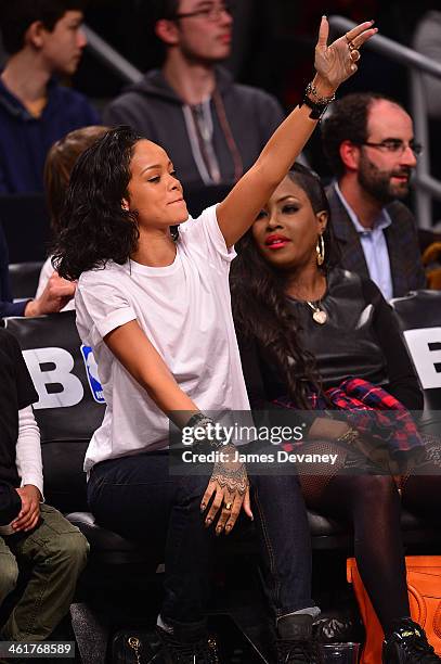 Rihanna attends the Miami Heat vs Brooklyn Nets game at Barclays Center on January 10, 2014 in the Brooklyn borough of New York City.