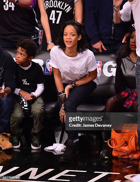 Rihanna attends the Miami Heat vs Brooklyn Nets game at Barclays Center on January 10, 2014 in the Brooklyn borough of New York City.