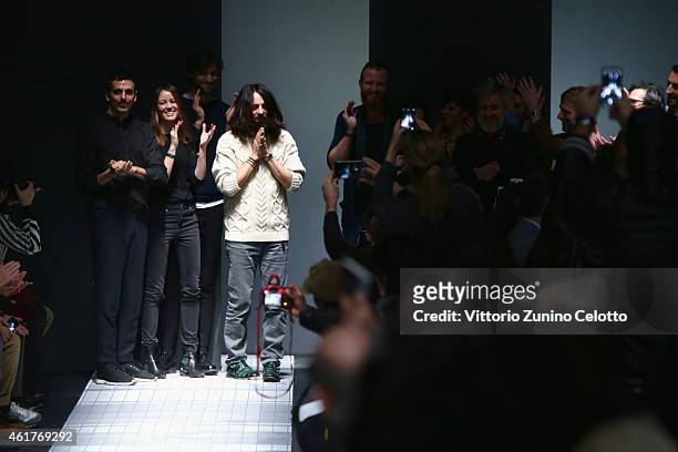 Alessandro Michele and the designers team walk the runway at the end of the Gucci Show as part of Milan Menswear Fashion Week Fall Winter 2015/2016...