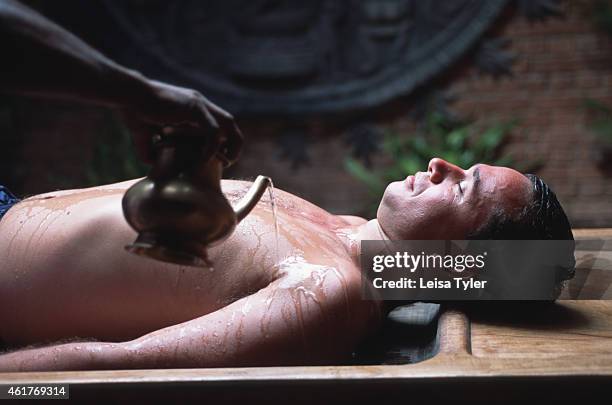 Patient recieving Pizhichil at the Somatheeram Ayurvedic Beach Resort. Pizhichil is an ayurvedic treatment where herbal oil is poured over the body...