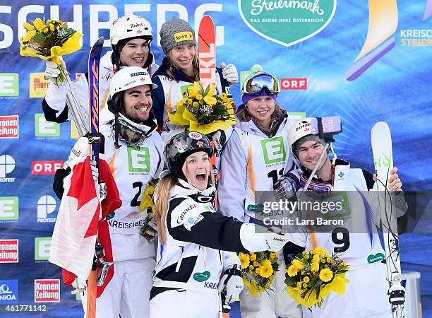 Second placed Justine Dufour-Lapointe of Canada takes a selfie of Mikael Kingsbury of Canada, Marc-Antoine Gagnon of Canada, Philippe Marquis of...