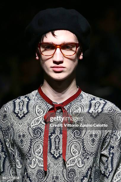 A model wals the runway during the Gucci Show as part of Milan Menswear Fashion Week Fall Winter 2015/2016 on January 19, 2015 in Milan, Italy.