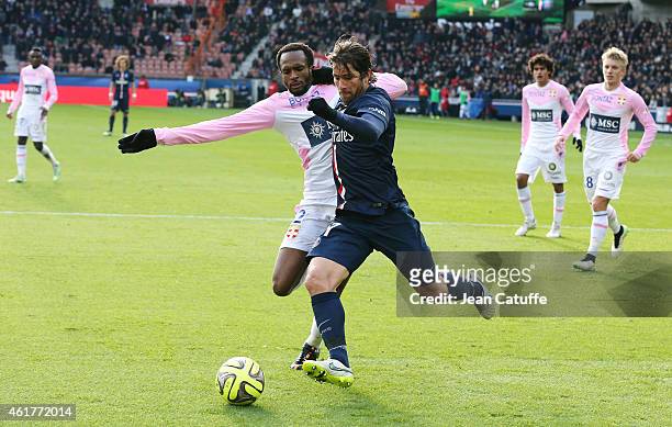 Kassim Abdallah of Evian and Maxwell Scherrer of PSG in action during the French Ligue 1 match between Paris Saint-Germain FC and Evian Thonon...