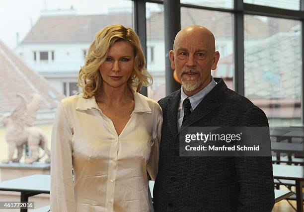Actors Veronica Ferres and John Malkovich pose for a photograph during the 'Casanova Variations' press conference at Ronacher Theater on January 19,...