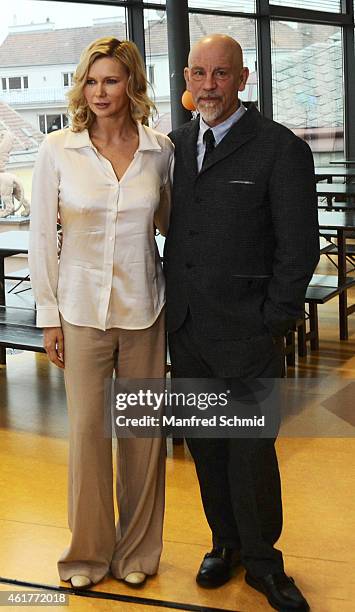 Actors Veronica Ferres and John Malkovich pose for a photograph during the 'Casanova Variations' press conference at Ronacher Theater on January 19,...