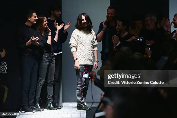 Alessandro Michele and the designers team walk the runway at the end of the Gucci Show as part of Milan Menswear Fashion Week Fall Winter 2015/2016...