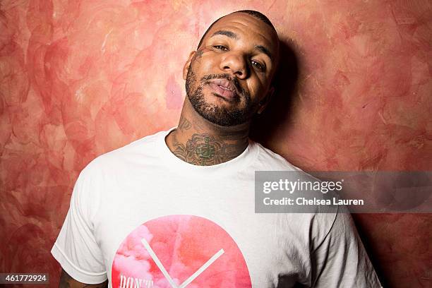 Rapper The Game poses backstage at "The Documentary" 10th anniversary party and concert on January 18, 2015 in Los Angeles, California.