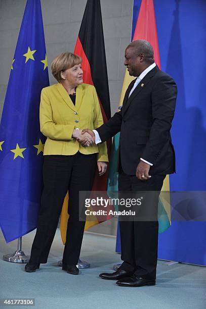 German Chancellor Angela Merkel shakes hands with Ghana President John Dramani Mahama a joint press conference at the Chancellery on January 19, 2015...