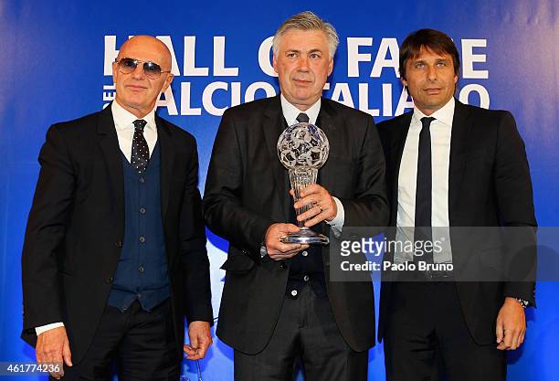 Arrigo Sacchi, Real Madrid head coach Carlo Ancelotti and Italy head coach Antonio Conte pose during the Italian Football Federation Hall of Fame...