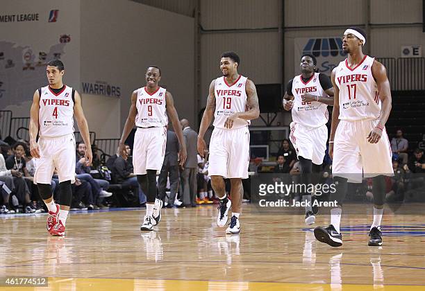 Nick Johnson, Jaron Johnson, Glen Rice Jr. #19, Clint Cappella and Toure Murry of the Rio Grande Valley Vipers walk onto the court while playing...